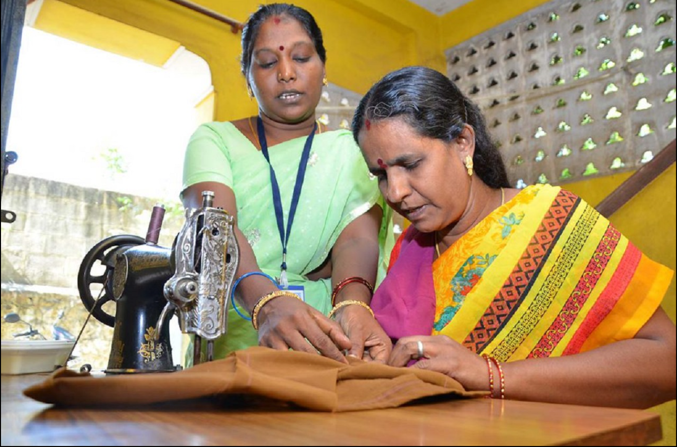 Women learning stitching in Mridulashray training center