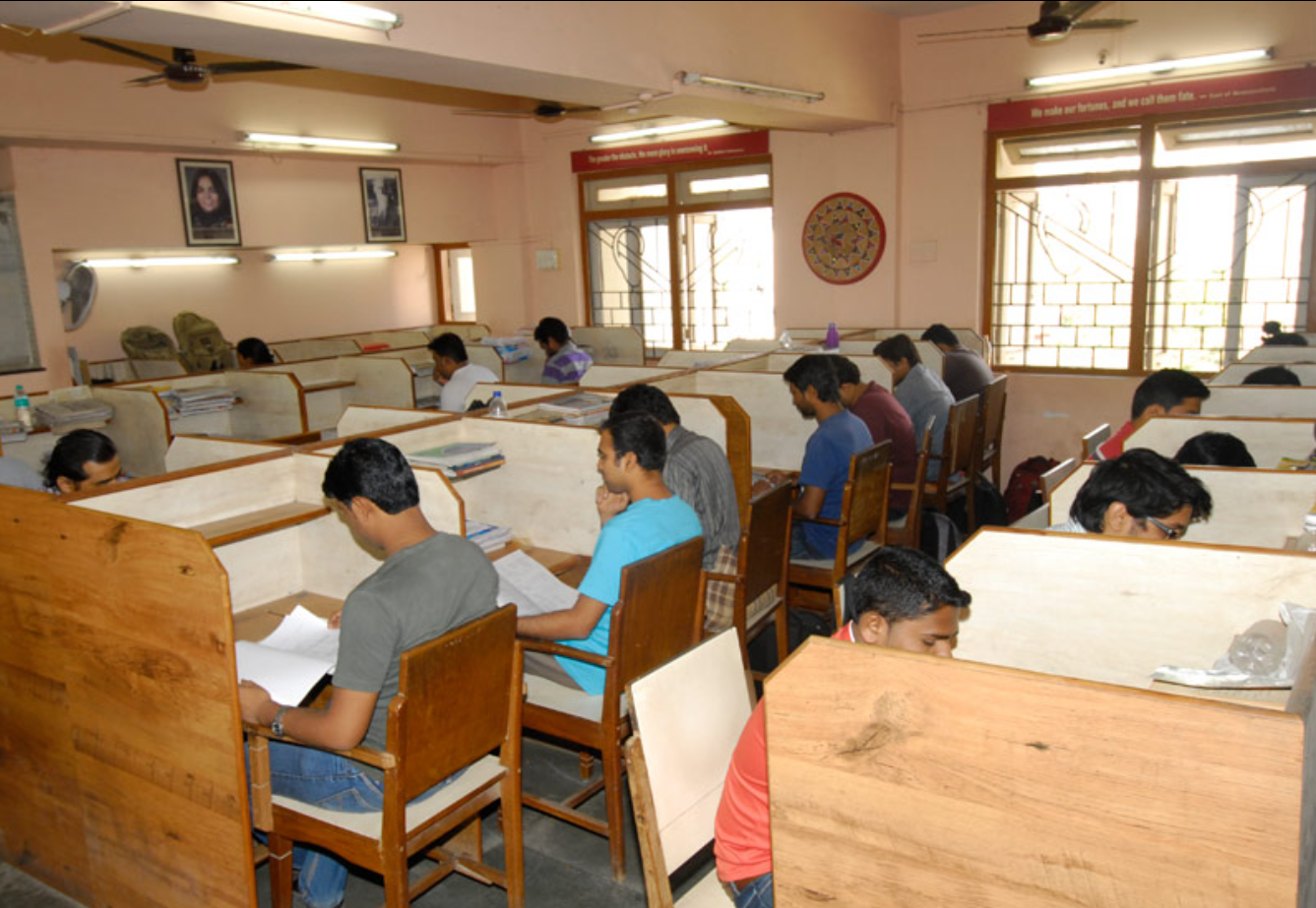 Students preparing for competitive exams in reading room