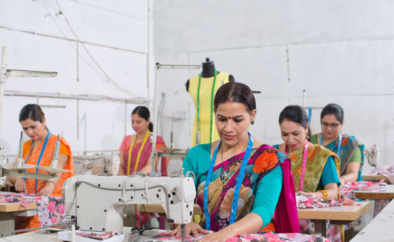 Women learning new skills at empowerment program